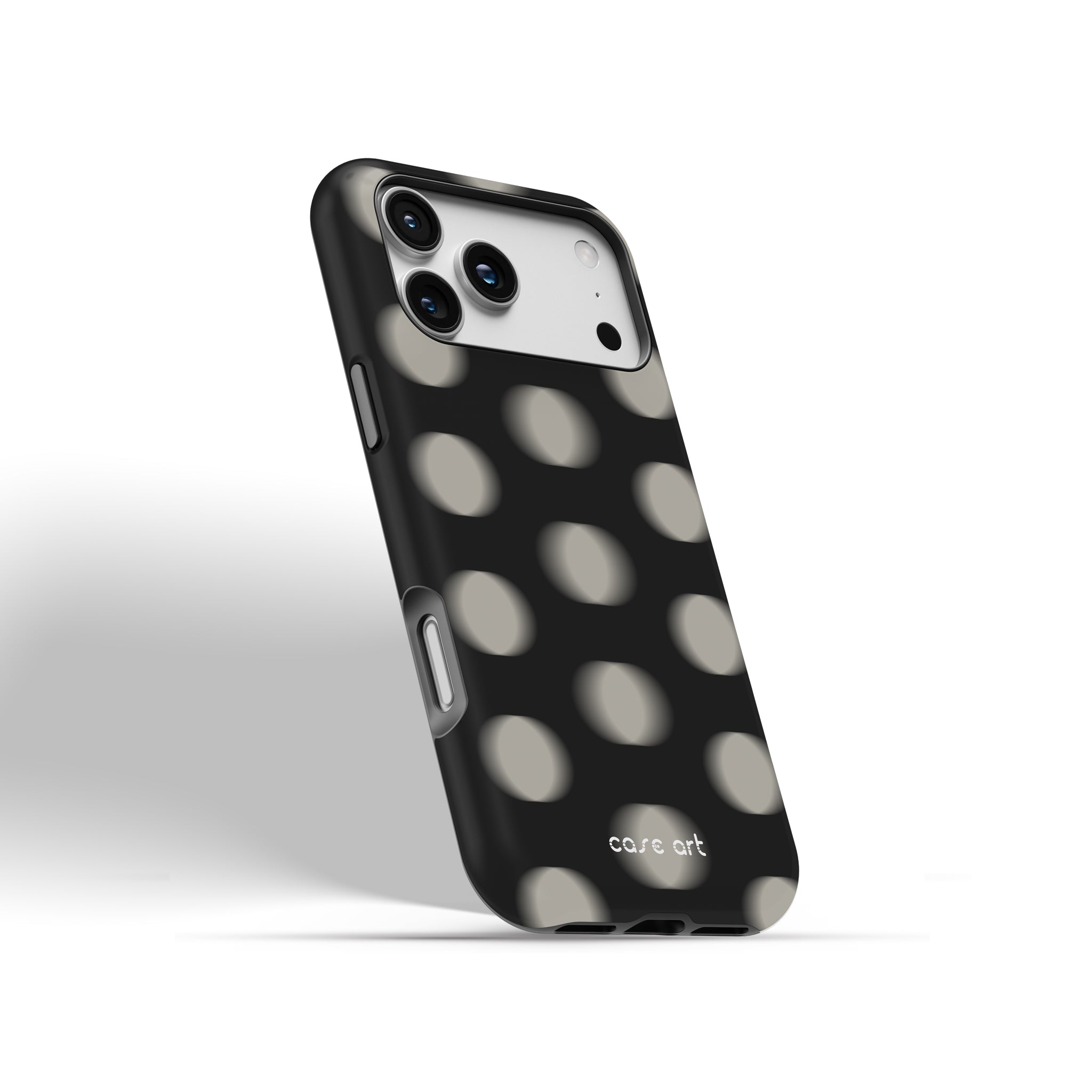 Phone case with black and white polka dot pattern on a white background