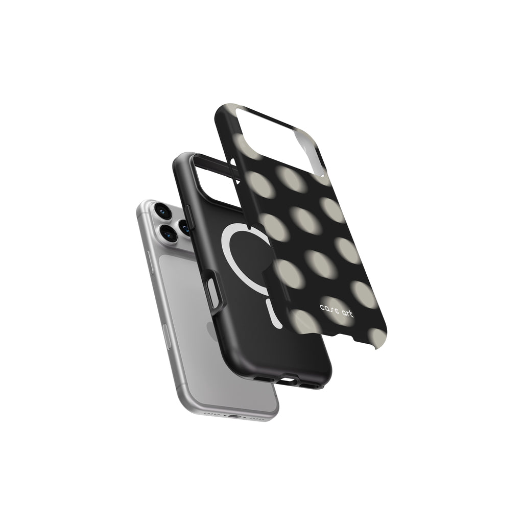Phone cases with polka dot design and clear back on a white background
